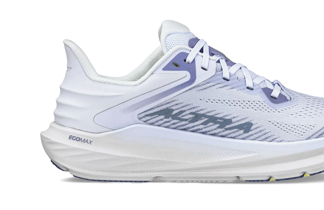 White running shoe with blue accents on a white background