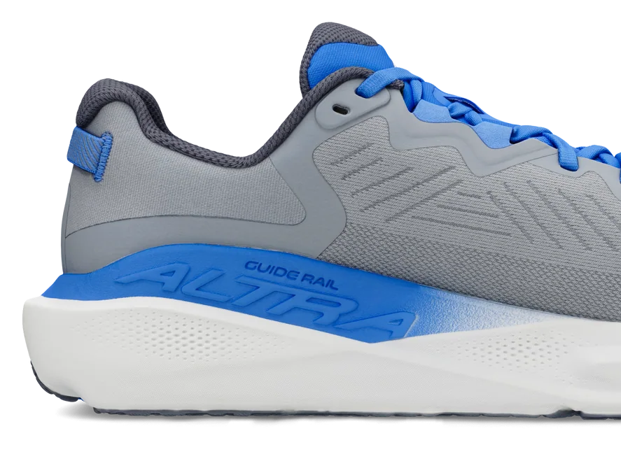 Gray and blue running shoe on a white background
