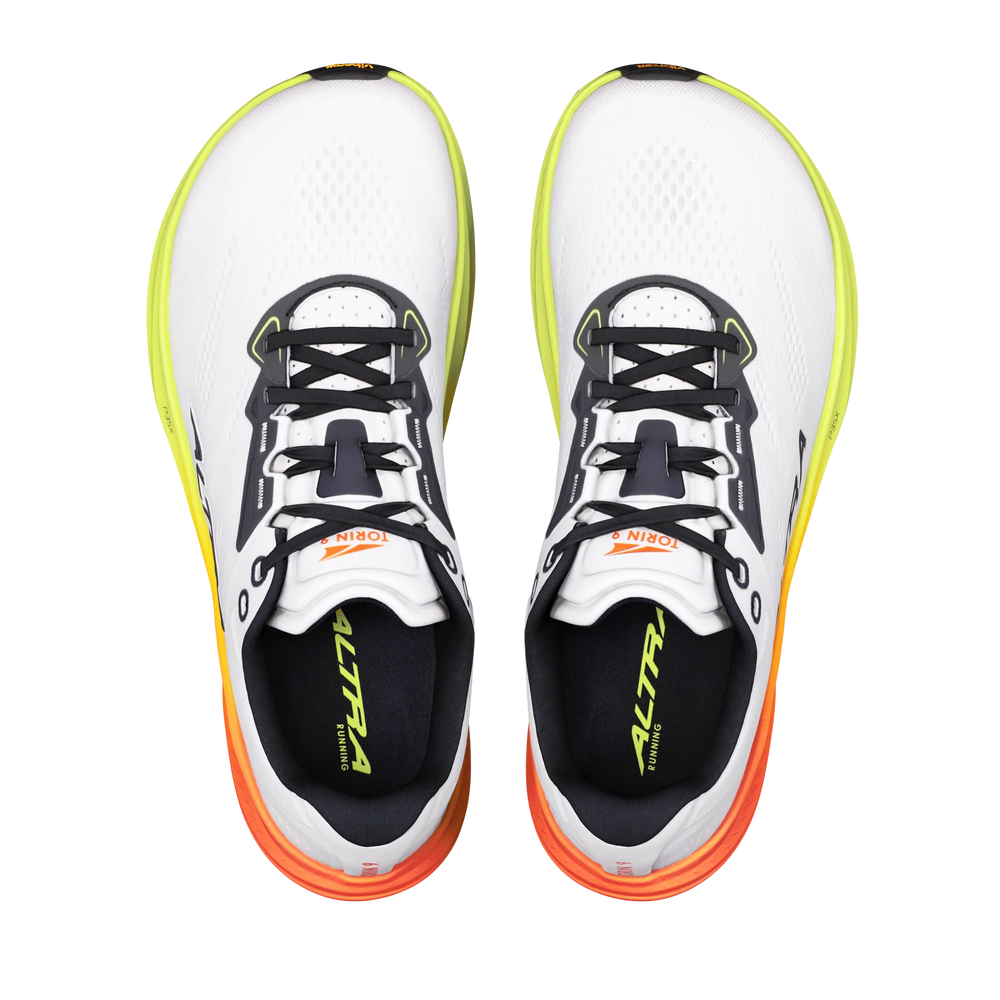 Torin 9 a men's pair of white running shoes with black and neon yellow details, shown from a top-down view on a white background.