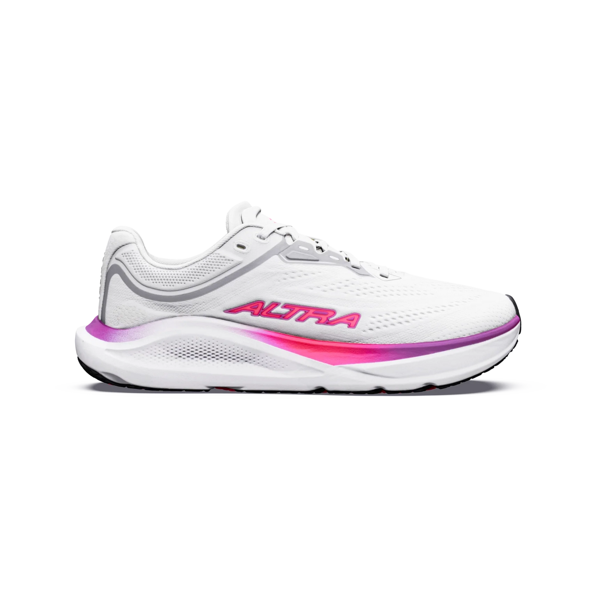 Torin ST 9 a women's white running shoe with gray and pink accents, featuring the brand name 'ALTRA' in pink on the side, shown against a plain white background.