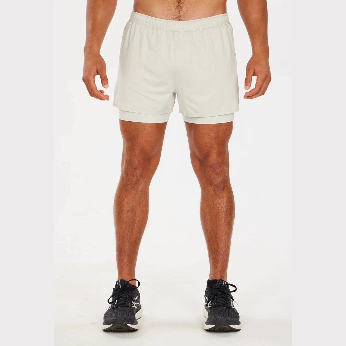 Person wearing white Alwrld Alrn 3" Mesh N.B.P Short – Men's on a white background