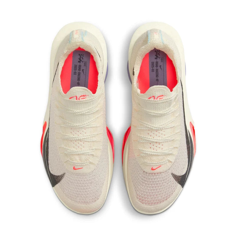 A pair of Nike Alphafly 3 – Women's running shoes in a light cream/off-white mesh with bright pink lining, red swooshes, and dark gray side accents, shown from a top-down view on a white background.
