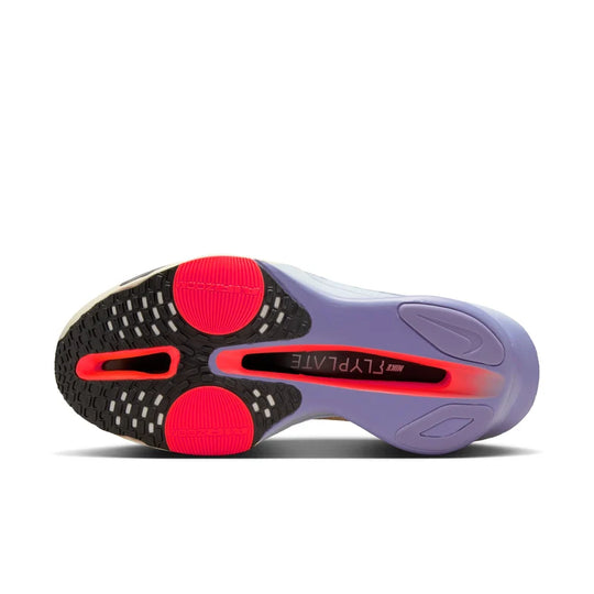 Sole of a running shoe with red and black accents on a white background