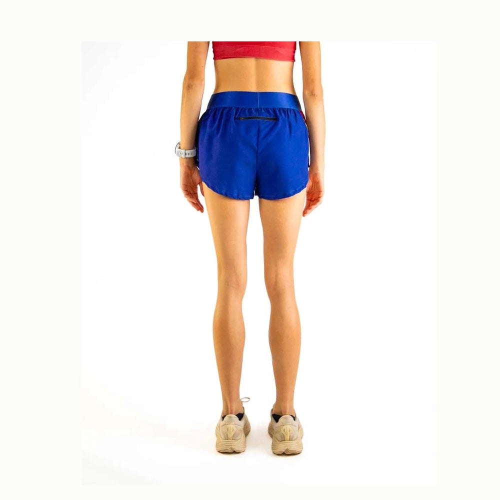 Person wearing blue Chicknlegs 1.5" Split Shorts – Women's on a white background