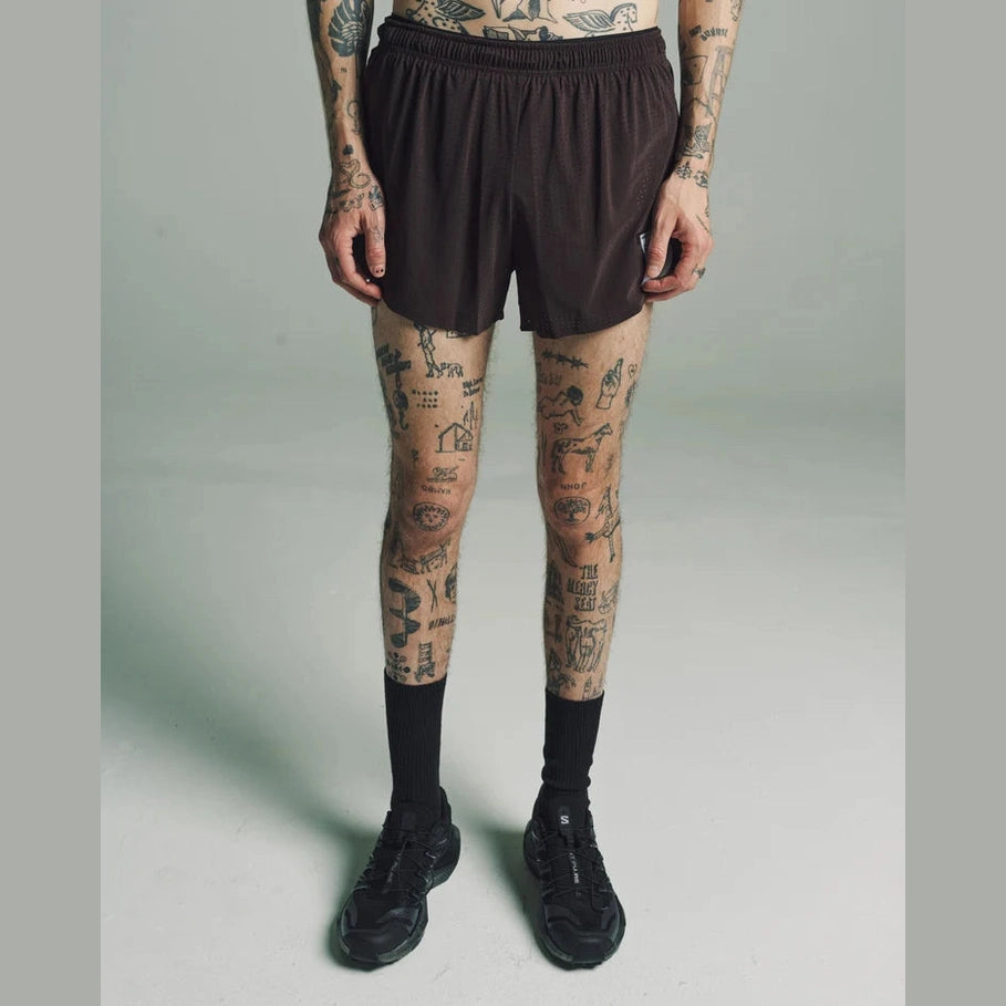 A model wearing dark brown Space-O Shorts--Men&