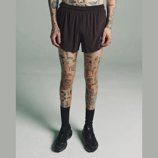A model wearing dark brown Space-O Shorts--Men&