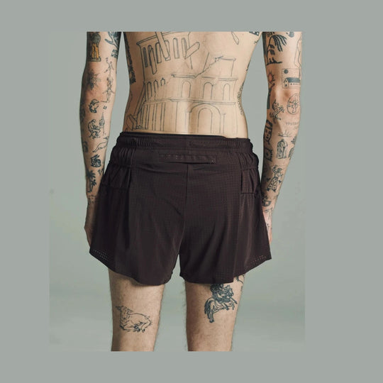 A man shown from the back wearing dark brown Space-O Shorts--Men&