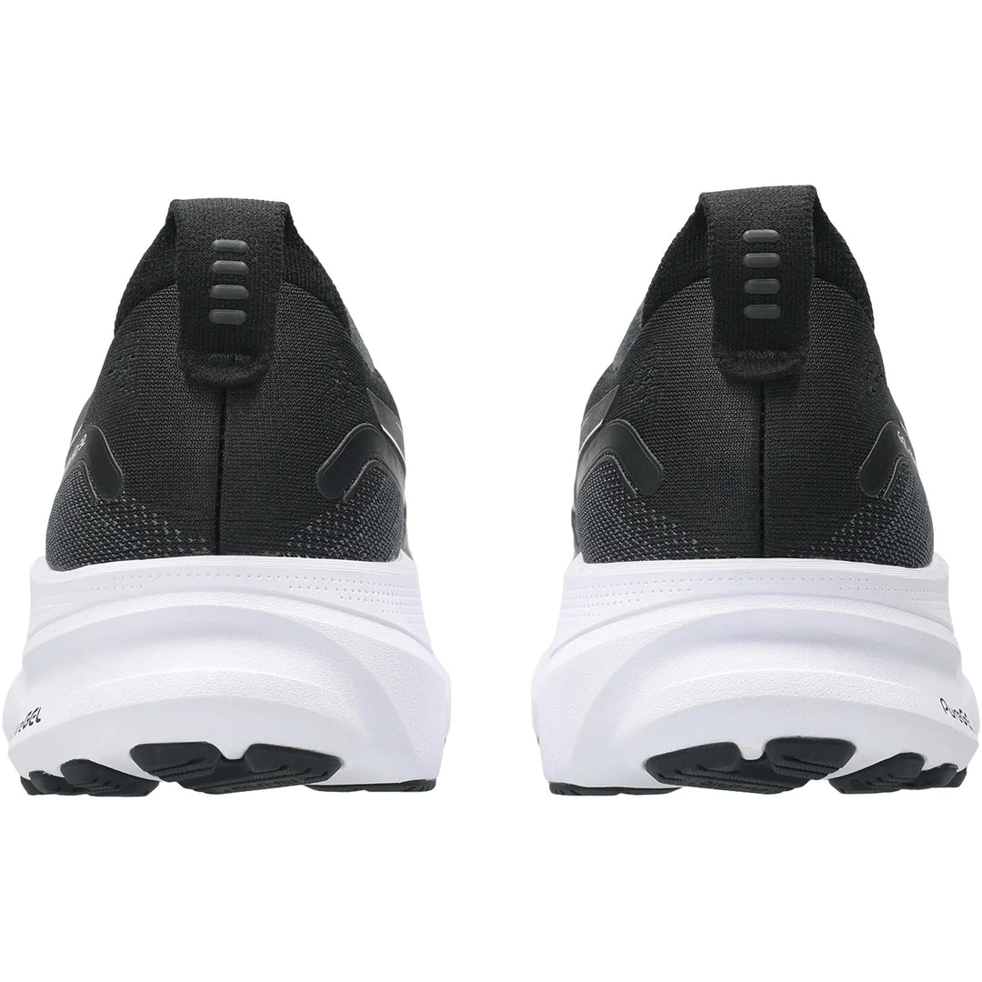 Black Gel-Kayano 32 running shoes with white soles on a white background