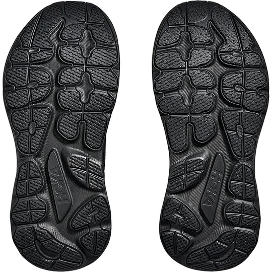 Black rubber sole of a shoe with brand logo on a white background