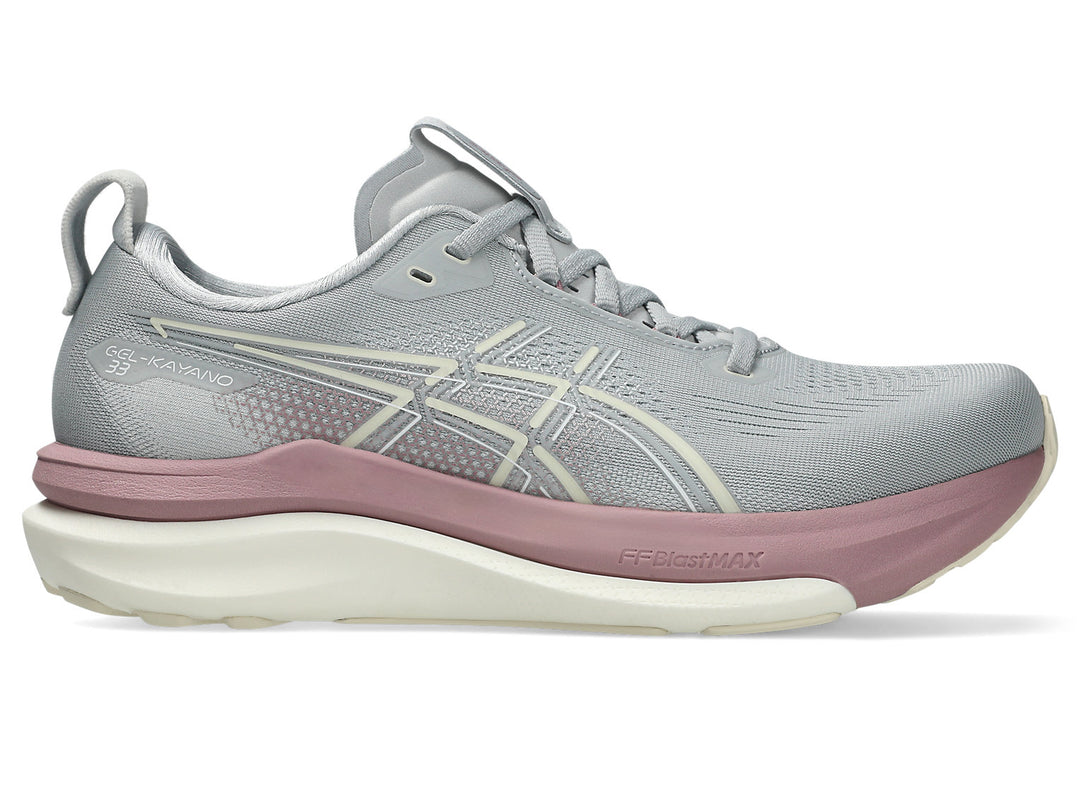 Gray Asics Kayano 33 running shoe with pink sole on a white background