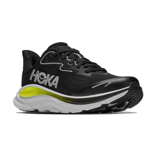 A black Clifton 10 -- Youth running shoe with a bright neon yellow-green midsole accent, white logo lettering, and a white and black sole, shown from a side profile on a white background.