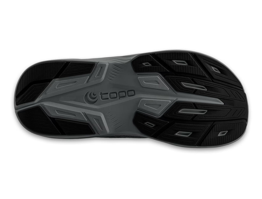 Black and gray sole of a shoe with &