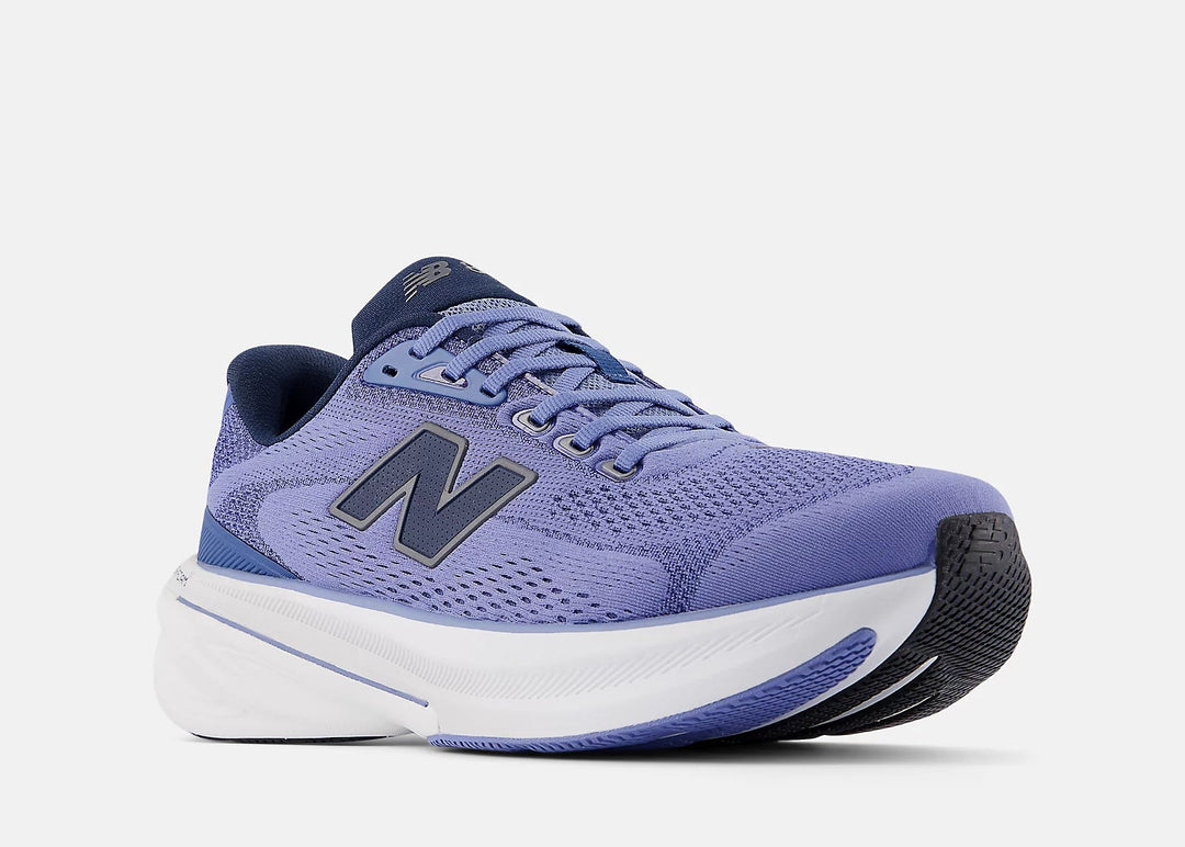 Blue running shoe with white sole on a light gray background