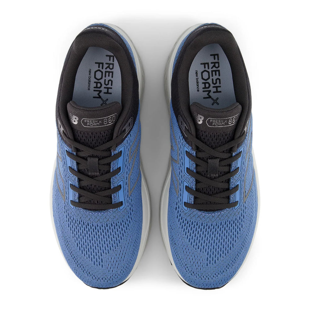 A pair of blue and black New Balance 860 V14 – Men's running shoes shown from a top-down view on a white background. The shoes feature a blue mesh upper, black laces, and a black collar with 'FRESH FOAM' branding visible on the insole.