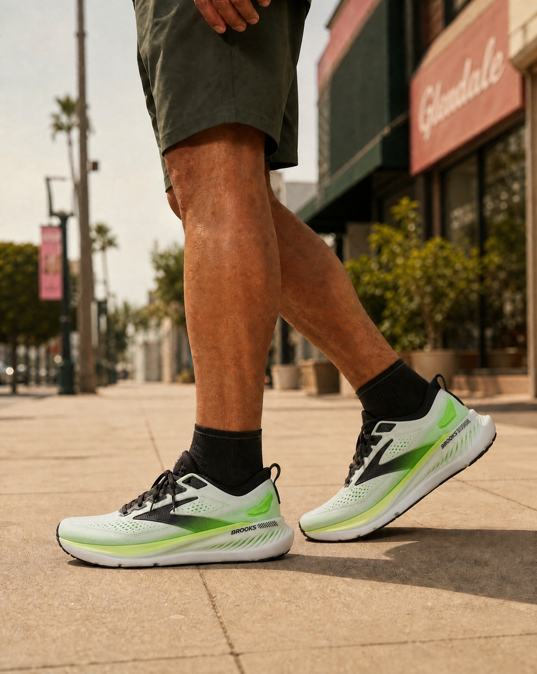 Man walking in Brooks Glycerin GTS 23 on sidewalk in Glendale, AZ.
