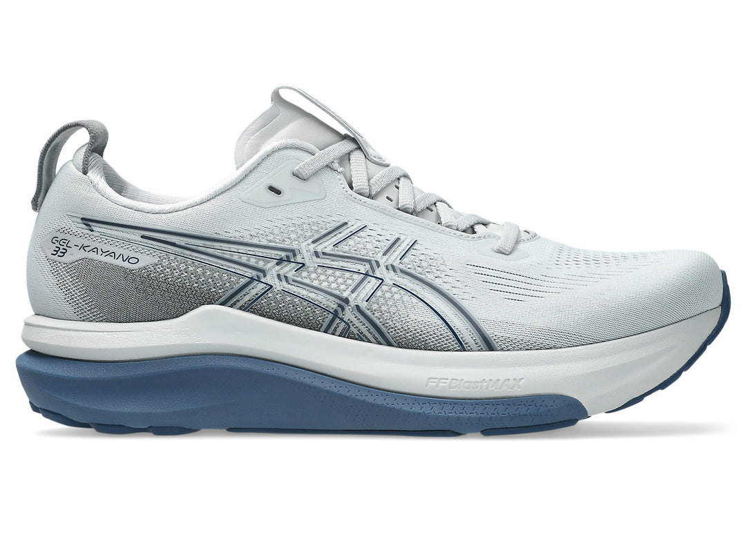 White grey Asics Kayano 33 running shoe with blue sole on a white background