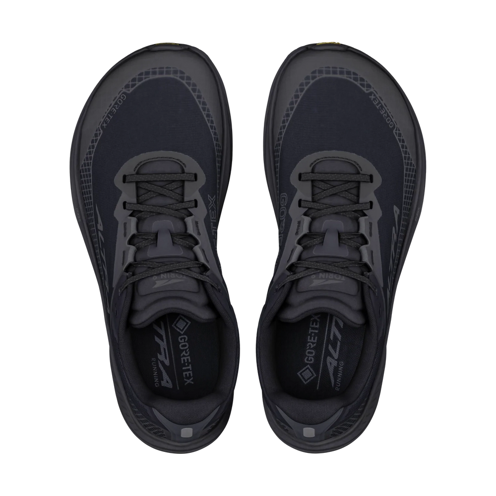 A pair of dark gray and black Altra Torin 9 GTX– Men's trail running shoes shown from a top-down view on a solid white background.