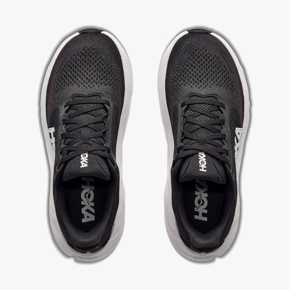 A pair of black and white Hoka Arahi 9 -- Men's running shoes shown from a top-down view on a light gray background.