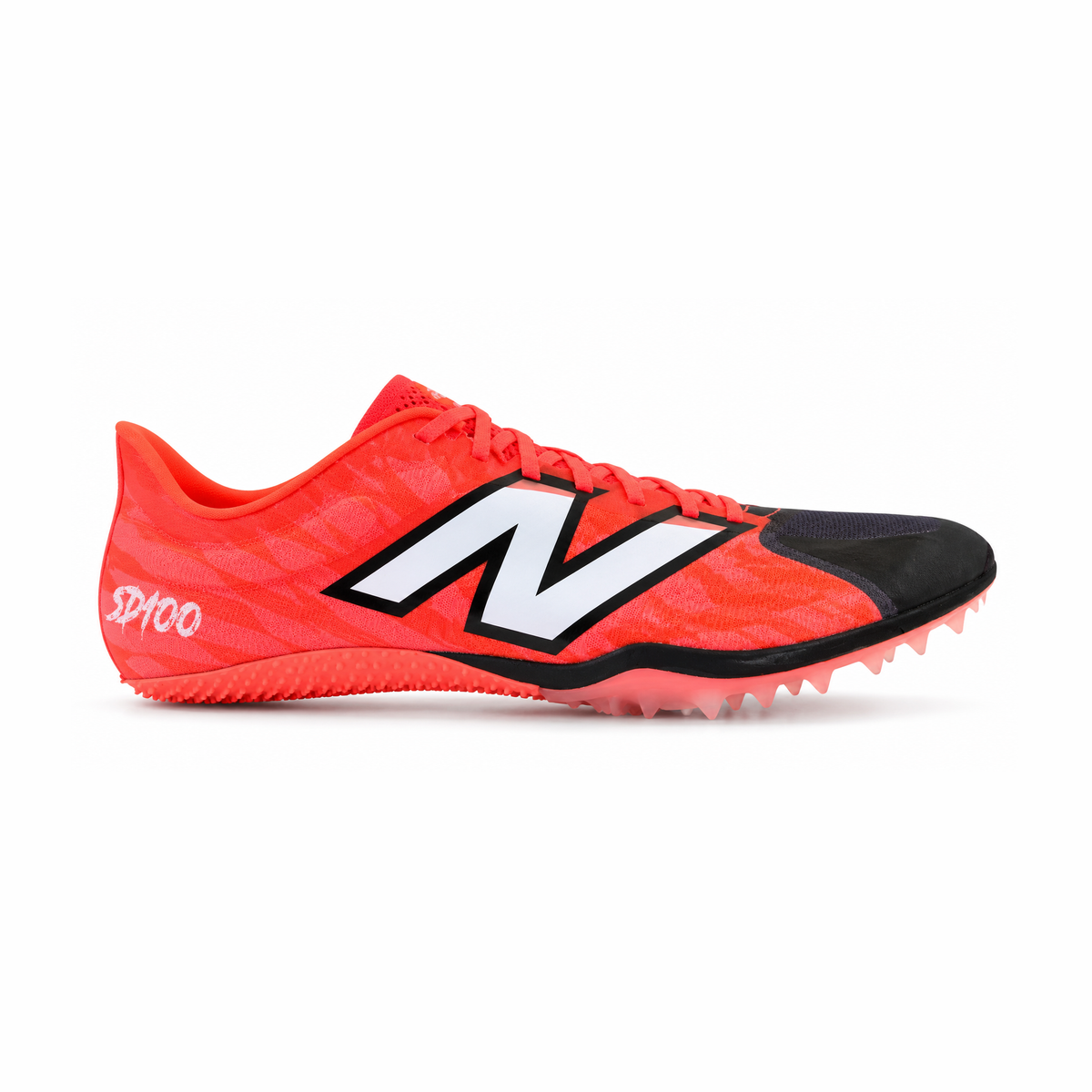 A New Balance Sd100 V5 – Men's track shoe in bright orange-red with a black toe cap, black and white 'N' logo, and spike sole, shown on a white background.