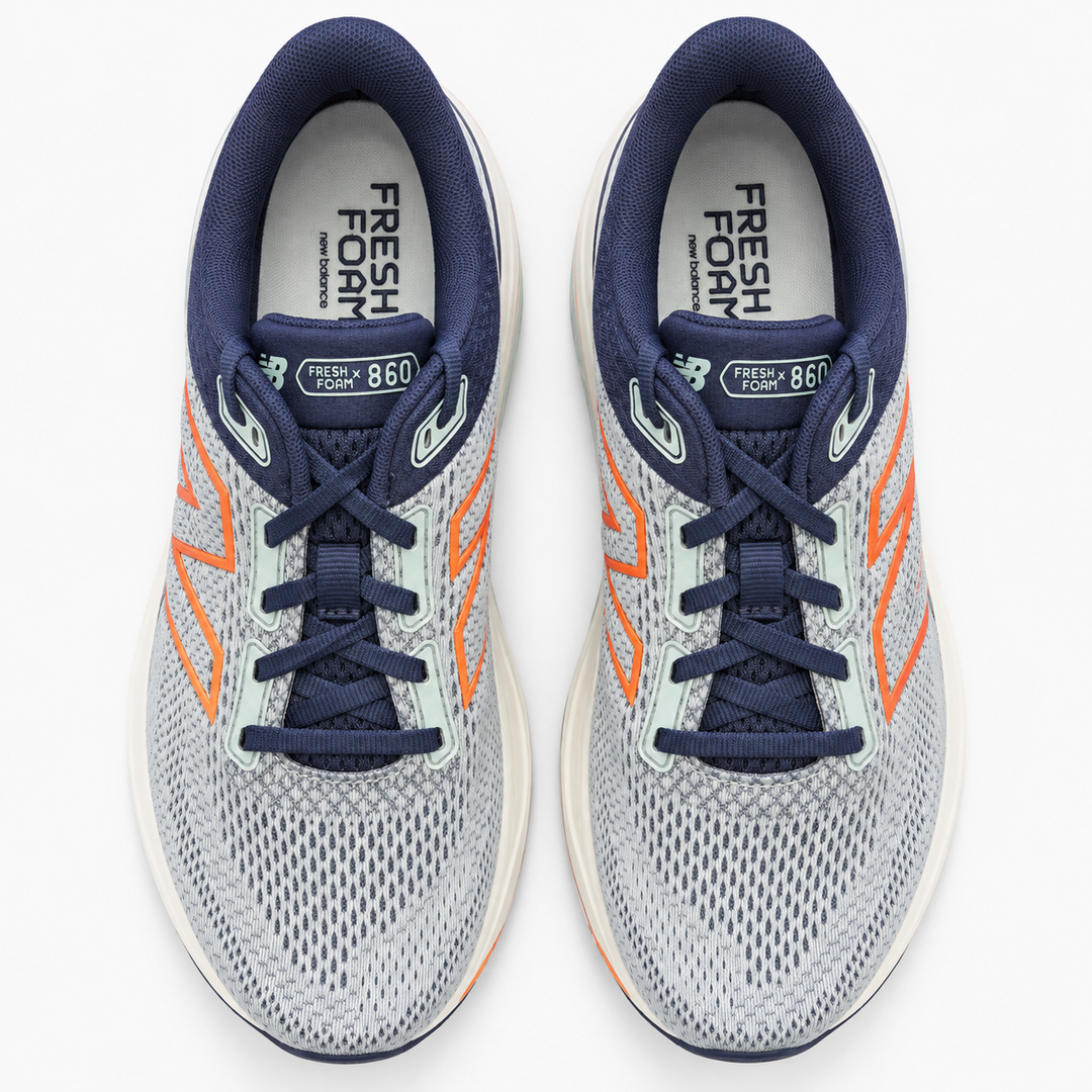 A pair of New Balance 860 V14 running shoes shown from a top-down view on a clean white background. The shoes feature a light gray and white mesh upper with navy blue accents on the collar, laces, and tongue, and orange side stripes.