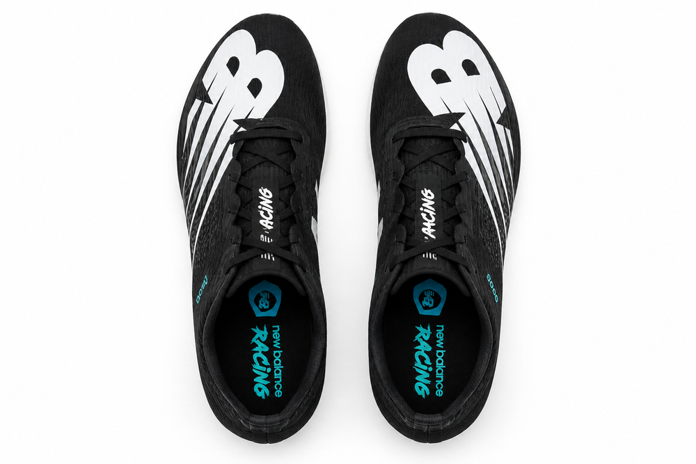 A pair of New Balance Md500 V7 – Women's Racing track shoes in black with white wing-like side stripes and teal branding details, shown from a top-down view on a white background.