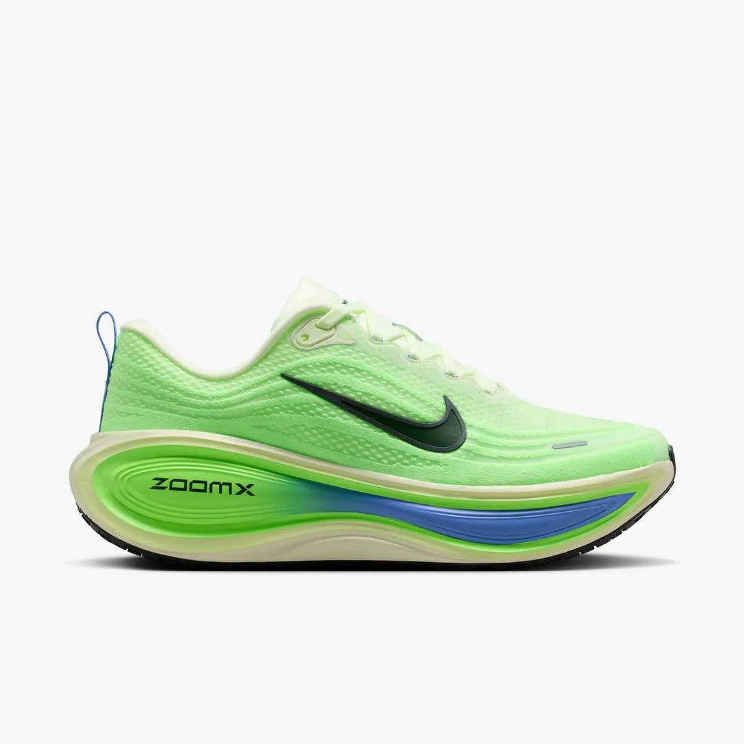 Green Nike Men's Vomero plus running shoe with Nike logo on a white background