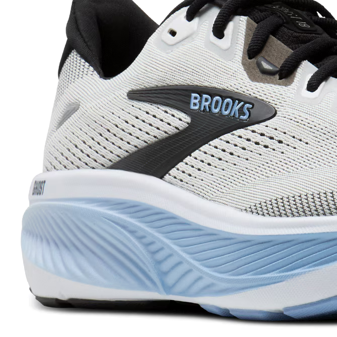 White Brooks Ghost 18 running shoe with blue sole and Brooks logo on a transparent background