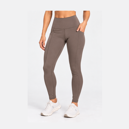 A model wearing high-waisted, form-fitting  Purestretch Legging – Women&