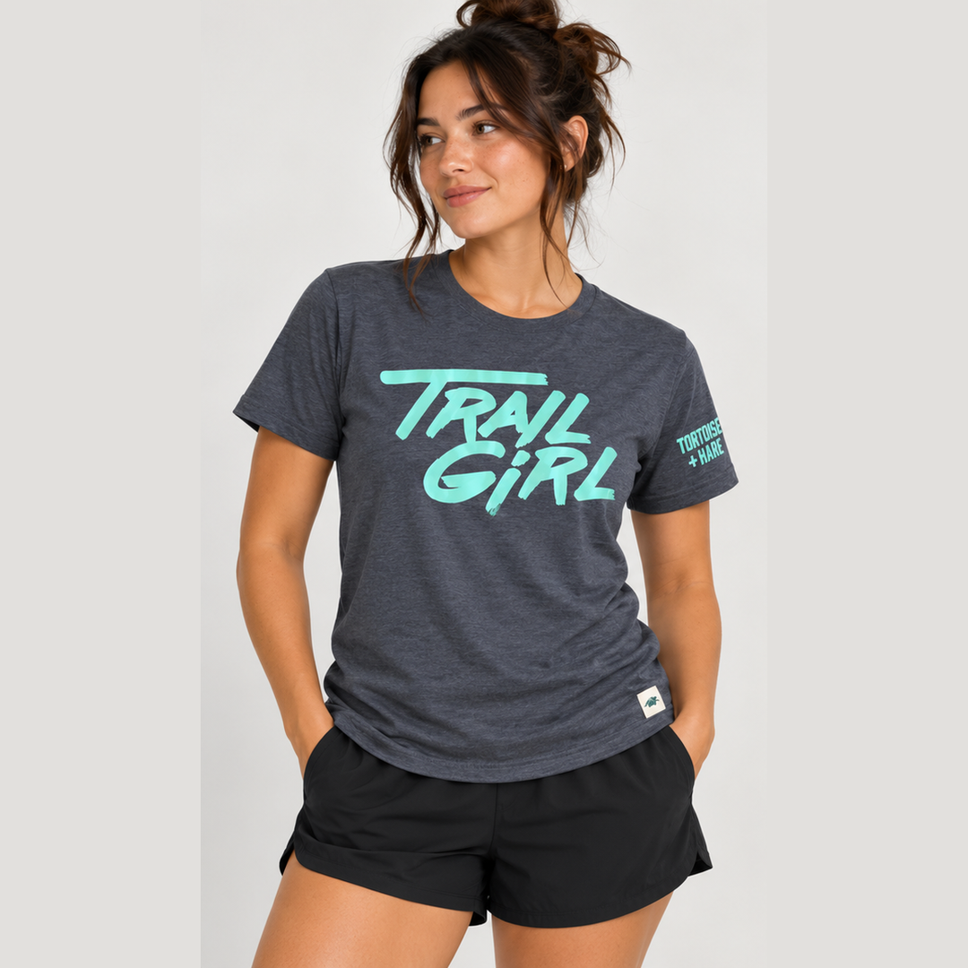 A woman wearing a dark heather gray Classic Fit S/S Sp - Trail Girl – Women&