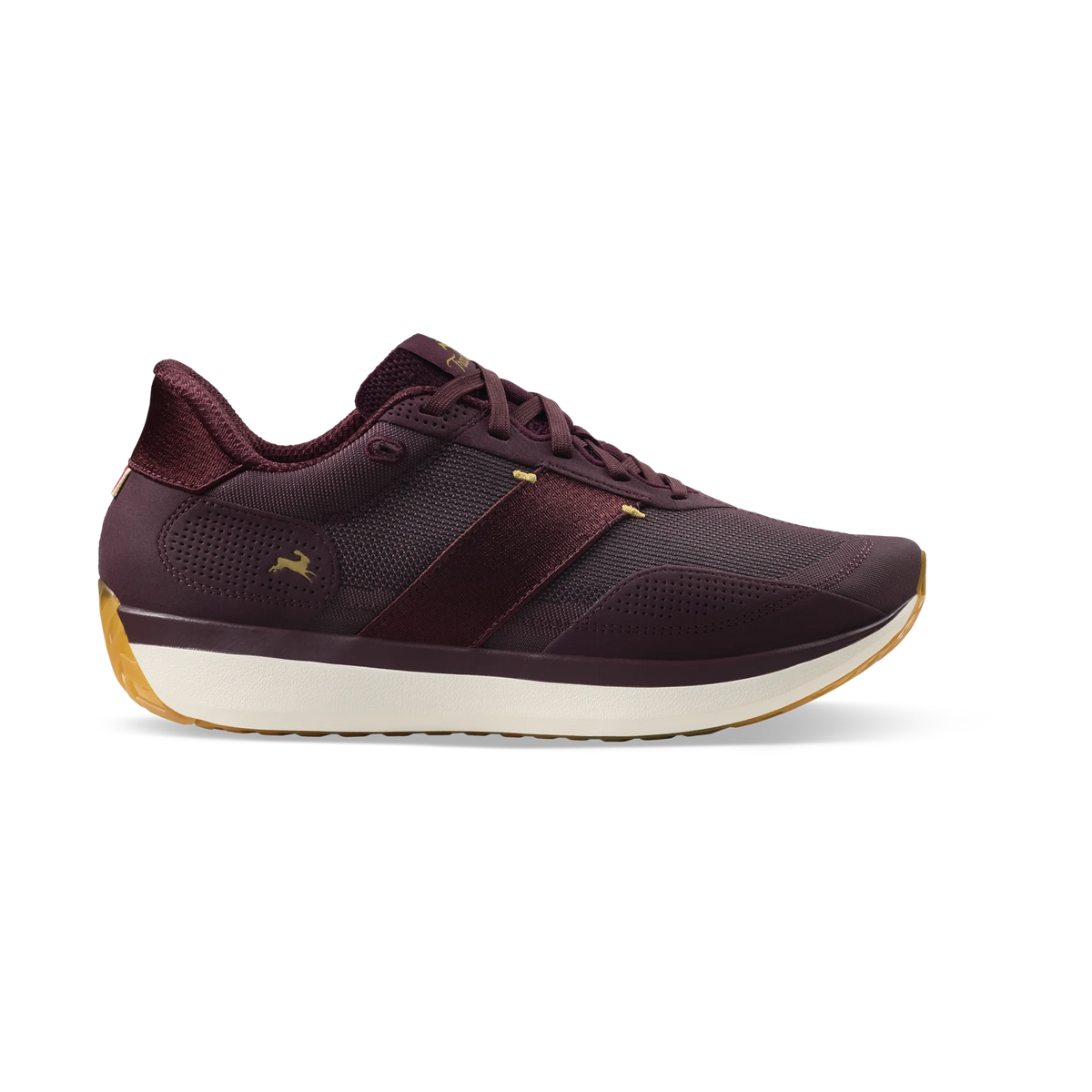 A single Tracksmith Eliot Ryder – All Gender athletic sneaker shown in profile against a solid white background. The shoe features a dark burgundy mesh upper with a wide burgundy side stripe, a thick cream midsole, and a gum outsole.