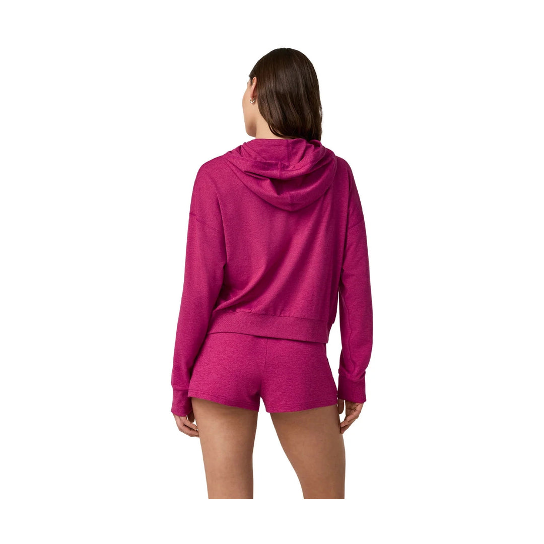 A model shown from the back wearing a matching magenta Halo Modern Full Zip Hoodie – Women&