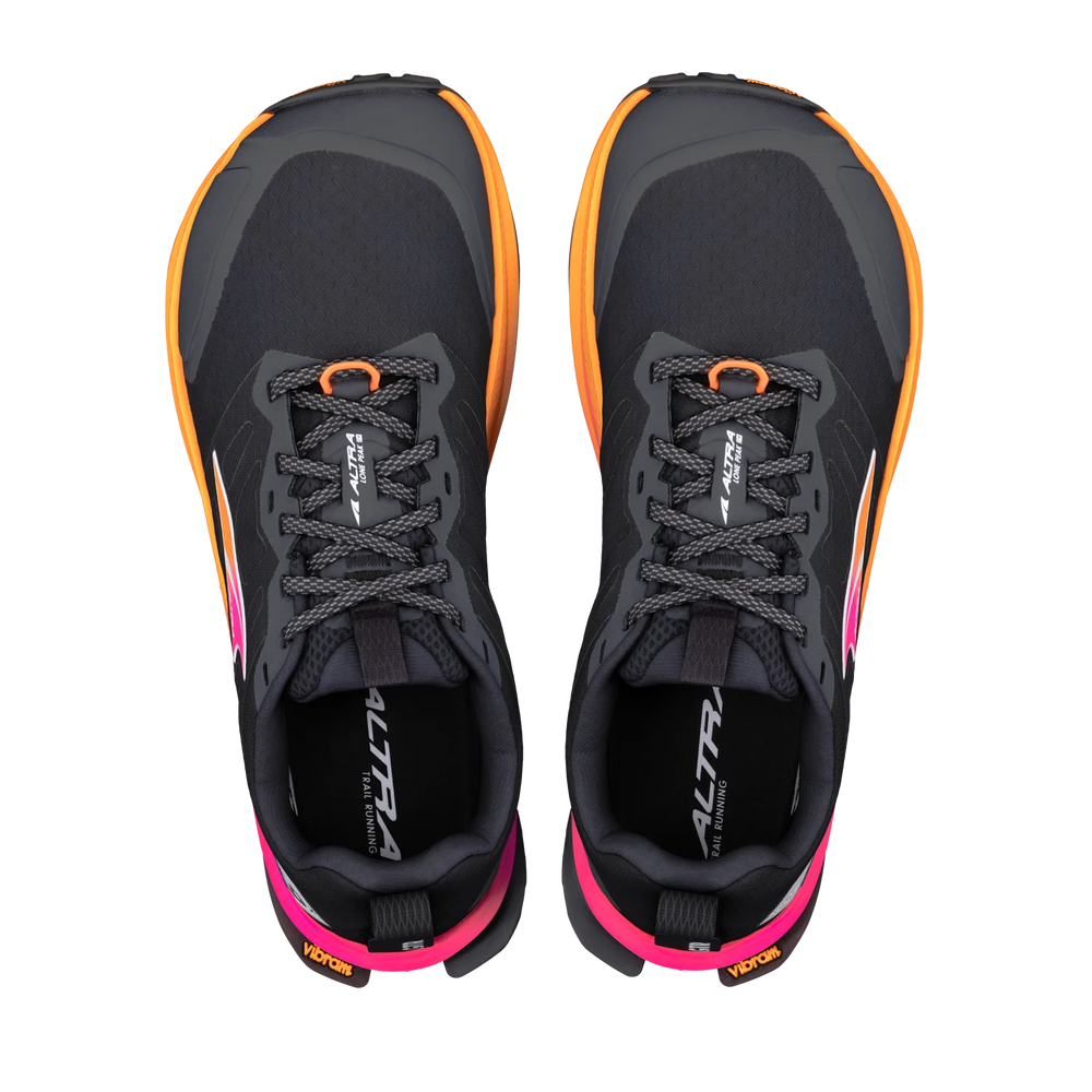 A pair of Altra Lone Peak 9+ – Women's trail running shoes shown from a top-down view on a solid white background. The shoes are primarily black and dark gray with vibrant orange accents on the toe caps and laces, and a bright pink heel pull tab.