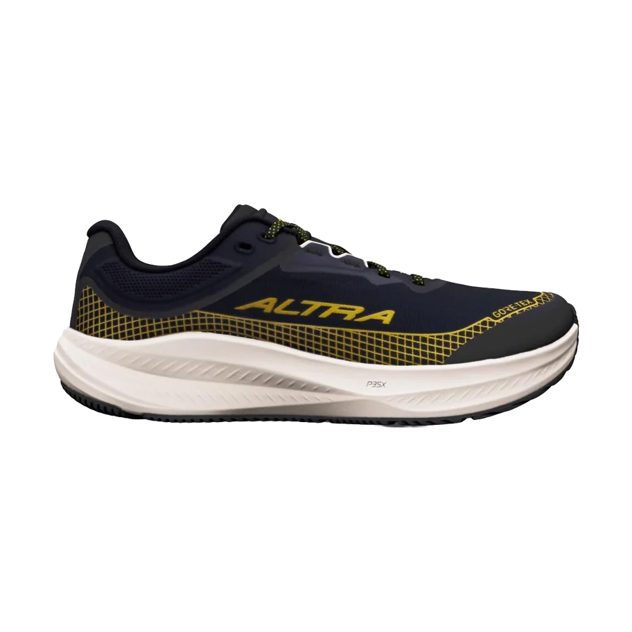 A single Altra Torin 9 GTX – Women's running shoe shown in profile against a solid white background. The shoe features a dark navy blue upper with yellow mesh accents and the brand name 'ALTRA' printed in yellow on the side, a thick white midsole, and a black outsole.