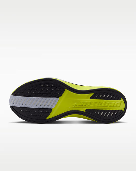 The outsole of a running shoe in neon yellow-green, black, and light gray.