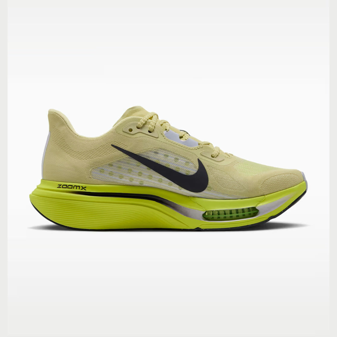 A Pegasus Plus 2 -- Women's running shoe in pale yellow with a bright neon yellow sole, a black Swoosh logo, and a silver accent on the midsole, shown against a light gray background.