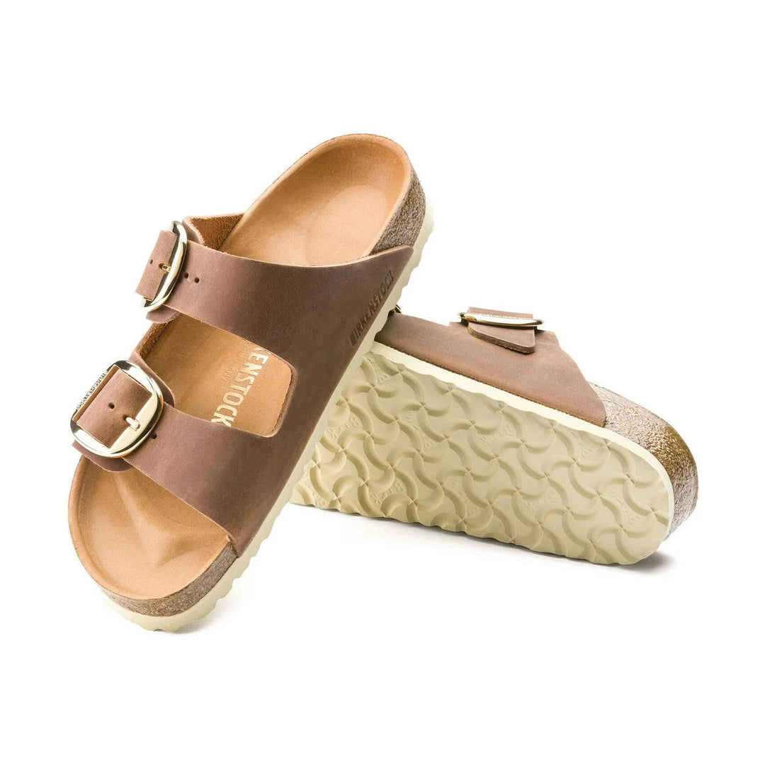 Brown sandals BIRKENSTOCK Arizona Big Buckle with gold buckles on a white background