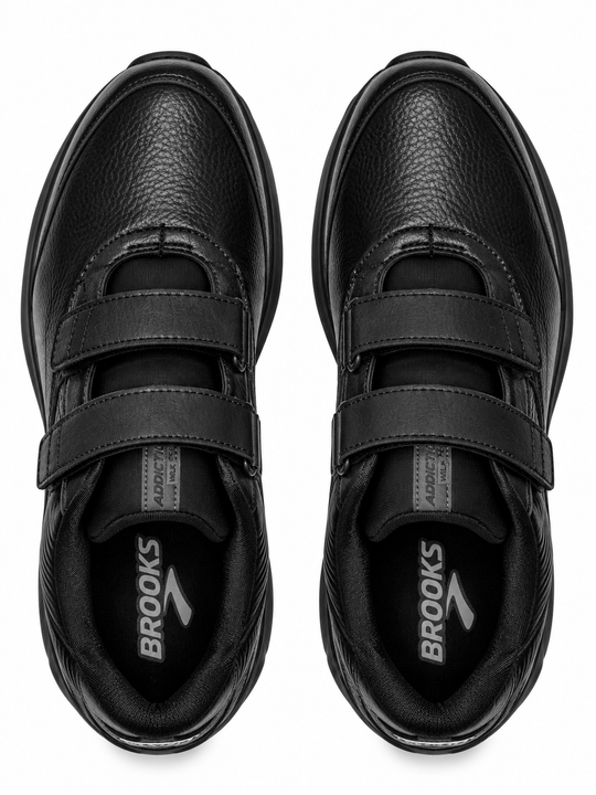 A pair of black Brooks Addiction Walker V-Strap 2 – Men&