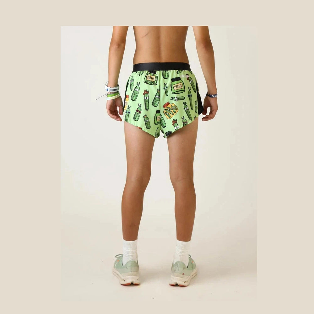 Person wearing green patterned Chicknlegs 2" Split Shorts – Men's on a plain background