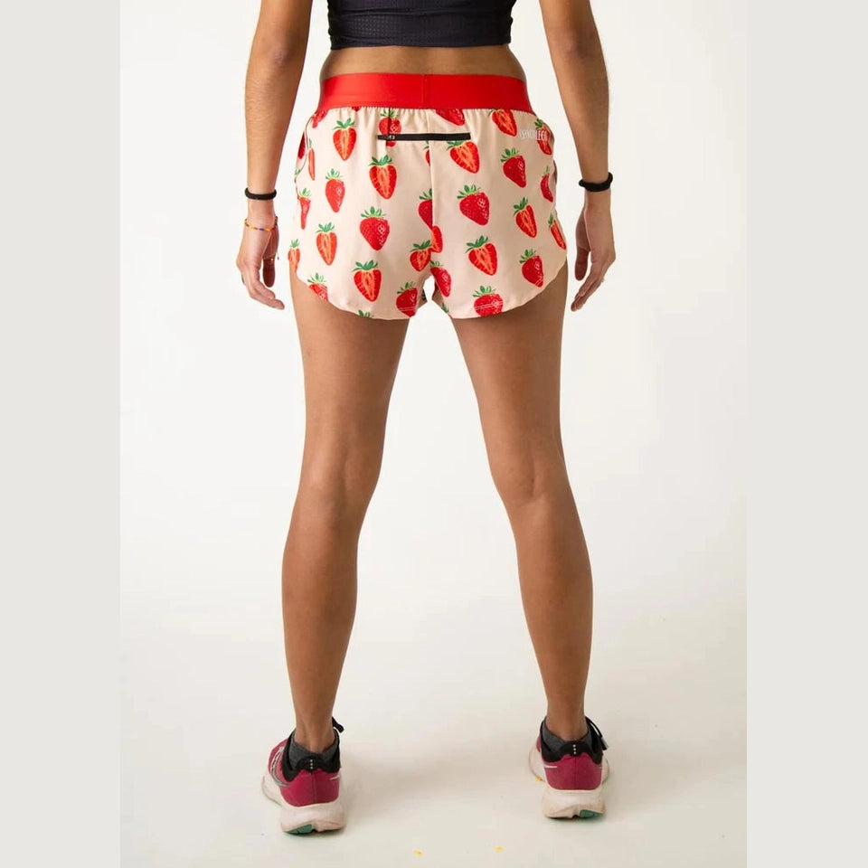 Person wearing strawberry-patterned Chicknlegs 1.5" Split Shorts – Women's on a white background