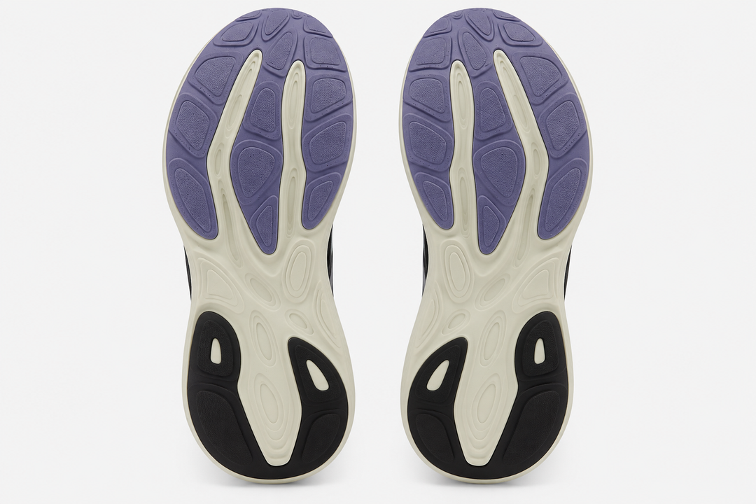 The outsoles of a pair of New Balance Fresh Foam X 880 V15 – Women&