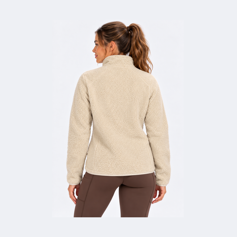 A woman shown from the back wearing a beige Sherpa Fleece Jacket – Women's and brown leggings against a plain white studio background.
