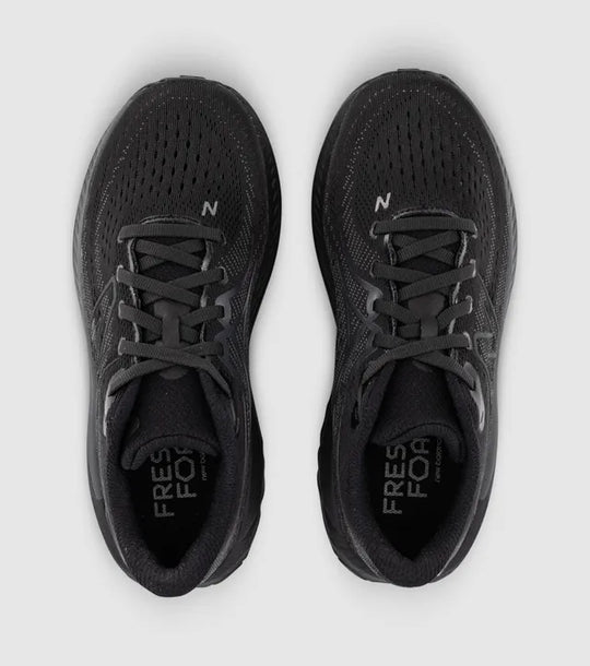 A pair of blackNew Balance 860 V13 – Kids&