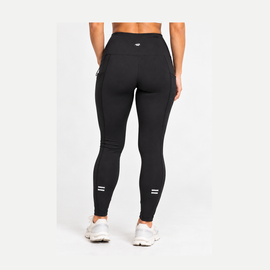 Rear view of a model wearing black high-waisted Run Tights – Women&
