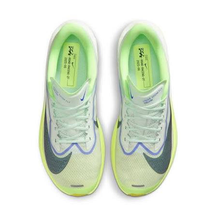 A pair of Nike Zoom Fly 6 – Men's running shoes in a light neon yellow-green and white colorway, shown from a top-down view on a white background.