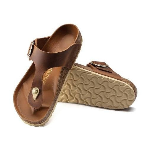 Pair of brown BIRKENSTOCK Gizeh Big Buckle sandals with a visible brand logo on a white background