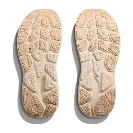A pair of beige Hoka Clifton 10 – Women&