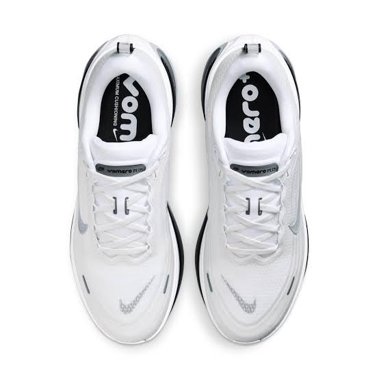 A pair of Nike Vomero Plus RR - Men's running shoes in white and black, viewed from a top-down perspective on a clean white background.