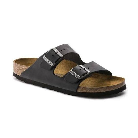 Black BIRKENSTOCK Arizona sandal with cork sole on a white background