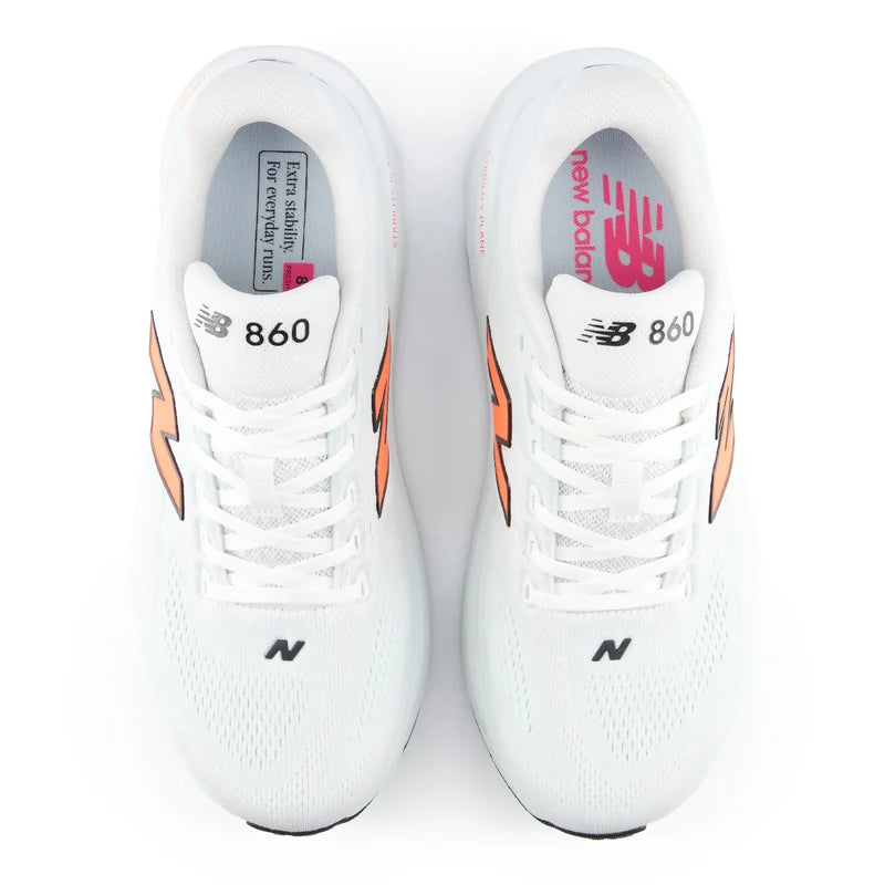 White New Balance Fresh Foam X 860 V15 running shoes with orange accents on a white background