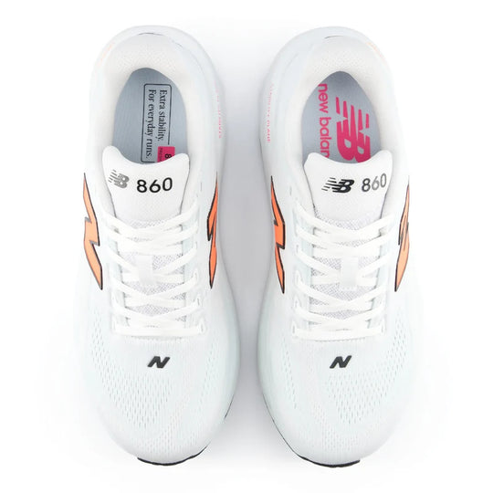 White New Balance Fresh Foam X 860 V15 running shoes with orange accents on a white background